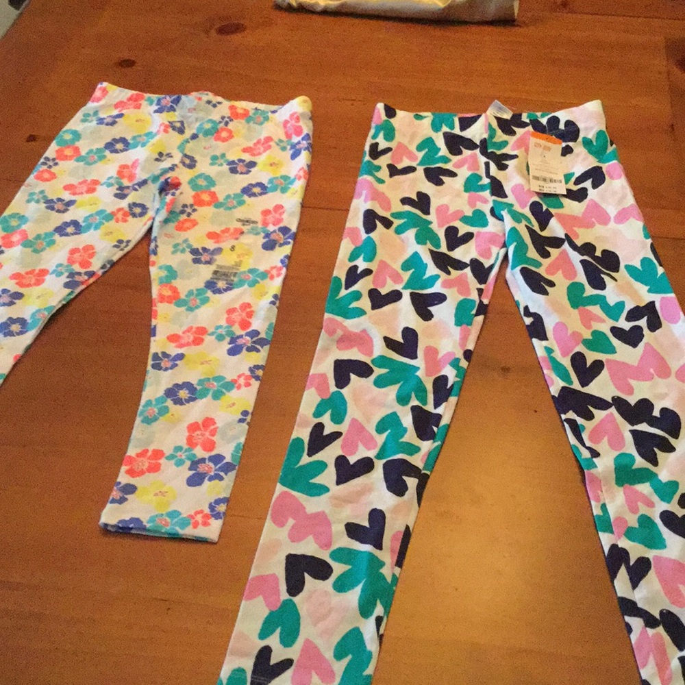 Size 8 leggings one is Capri one is long
